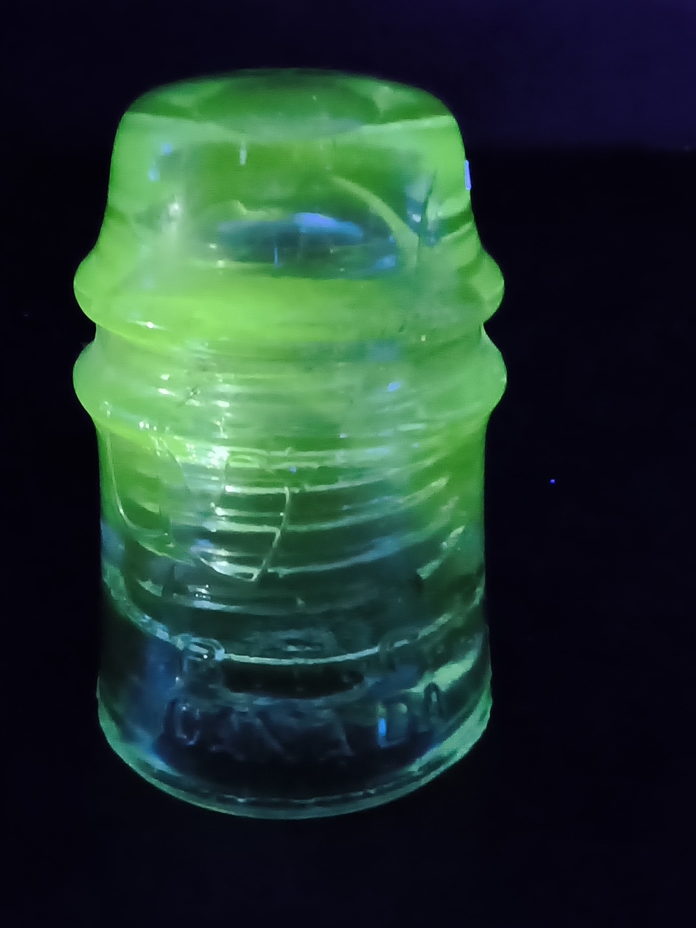 Antique BTC Canada Glass Insulator CD 102 Manganese 365nm UV Glow Telegraph